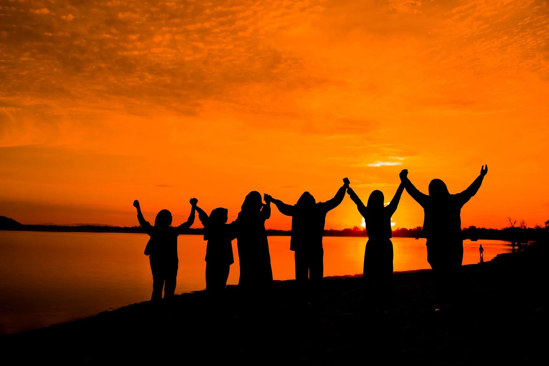 People united together at sunset